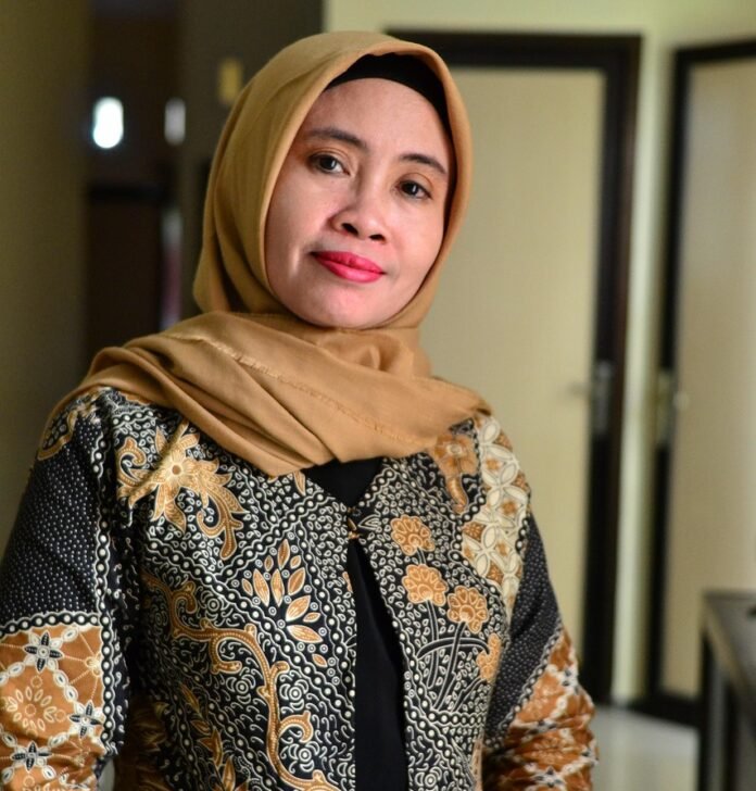 foto de uma mulher em trajes muçulmanos.