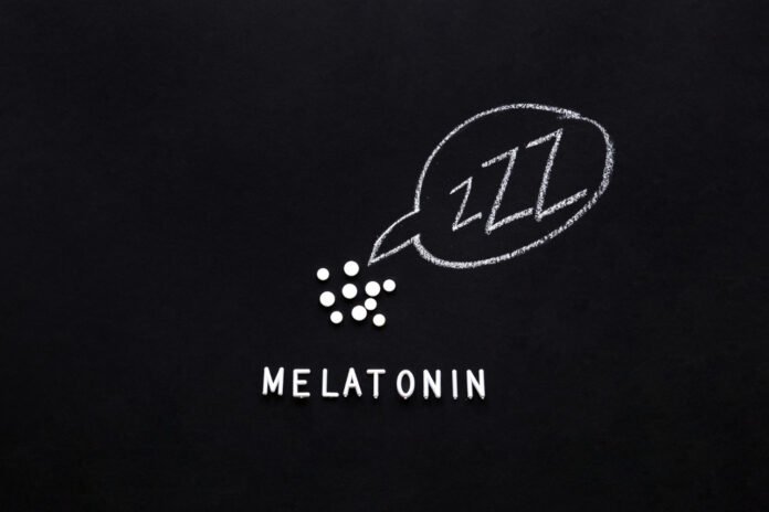 desenho de um balão de sono com capsulas de melatonina.